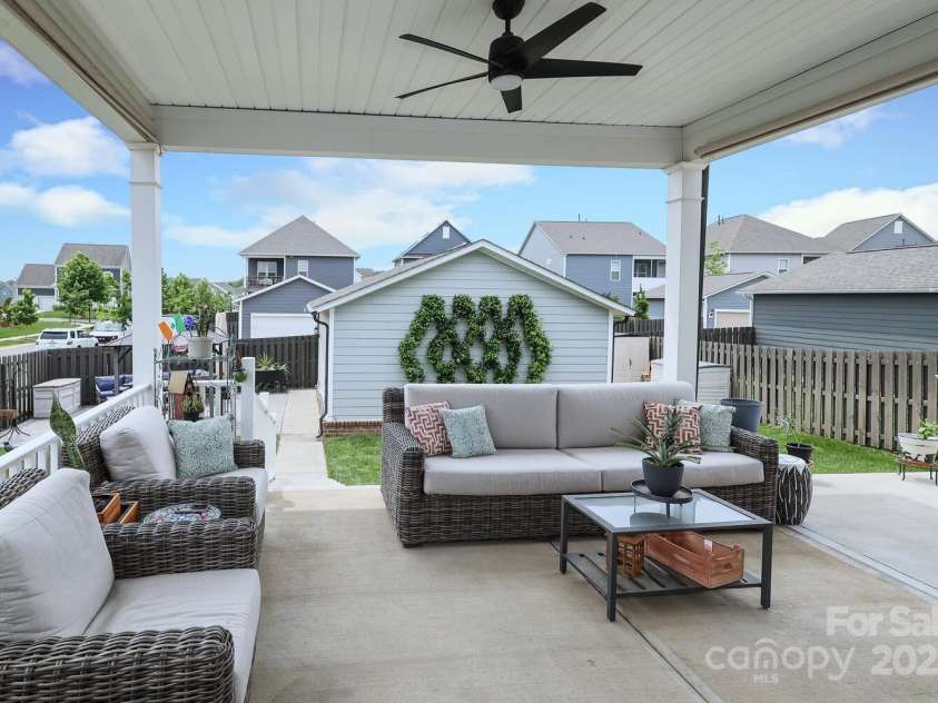 13624 Jacks Lane, Pineville, NC 28134.  MLS# CAR4251178, YatesRealty ID 19960. View to the backyard off the covered porch