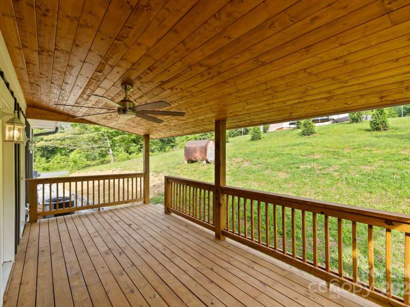 431 Pole Miller Extension, Brevard, NC 28712.  MLS# CAR4269813, YatesRealty ID 19961. Huge back deck that is covered. 