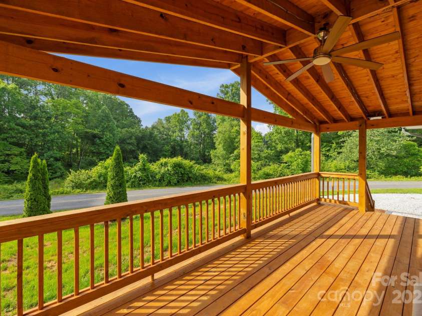 431 Pole Miller Extension, Brevard, NC 28712.  MLS# CAR4269813, YatesRealty ID 19961. Large front deck to enjoy!