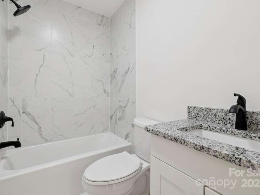 431 Pole Miller Extension, Brevard, NC 28712.  MLS# CAR4269813, YatesRealty ID 19961. Tile shower in guest bath as well!