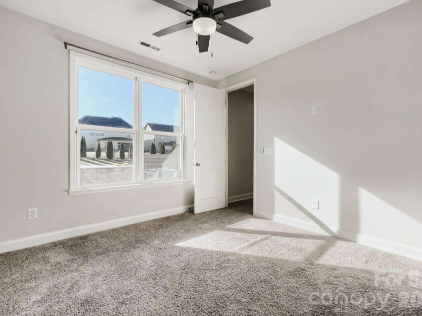 15213 Shallow Ridge Road, Charlotte, NC 28278.  MLS# CAR4432062, YatesRealty ID 19963. Main floor Guest bedroom
