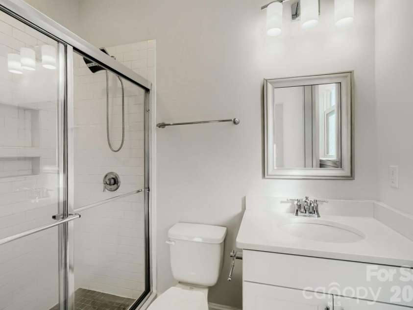 15213 Shallow Ridge Road, Charlotte, NC 28278.  MLS# CAR4432062, YatesRealty ID 19963. Main floor Guest bedroom en suite