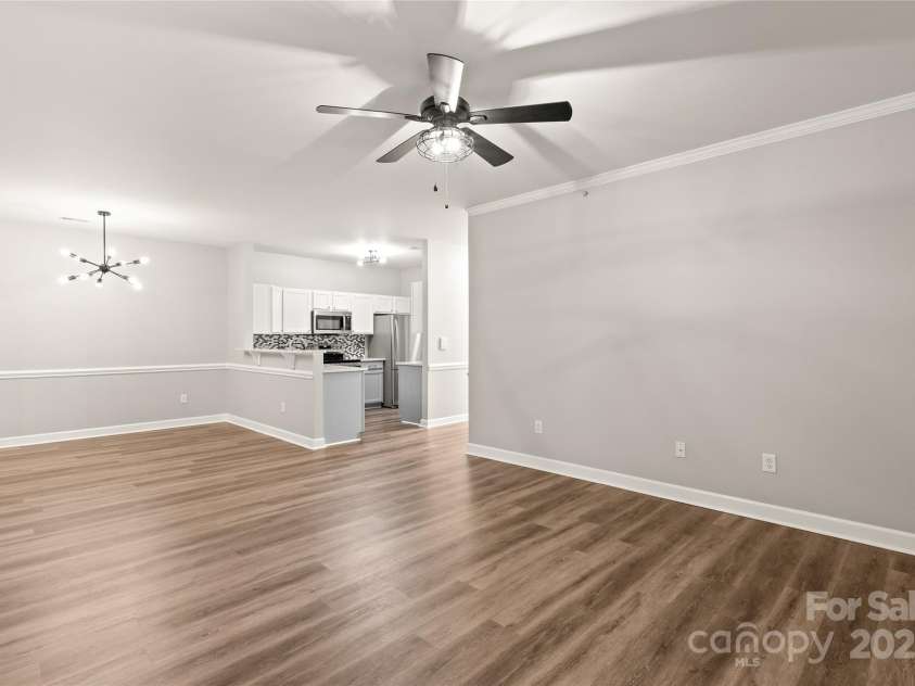 16344 Redstone Mountain Lane, Charlotte, NC 28277.  MLS# CAR4269073, YatesRealty ID 19967. Never miss a beat when entertaining. Open to the dining area and kitchen.