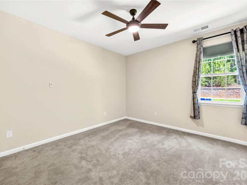 193 Abersham Drive, Mooresville, NC 28115.  MLS# CAR4391519, YatesRealty ID 19967. Main Level Secondary Bedroom