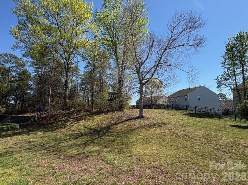 7332 Milltown Court, Concord, NC 28025.  MLS# CAR4360203, YatesRealty ID 19968. Huge rear yard with max potential!