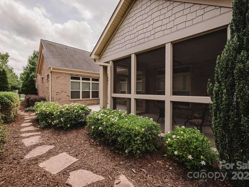 4518 COURTYARD Boulevard, Harrisburg, NC 28075.  MLS# CAR4267459, YatesRealty ID 19971. Full View of Garden Area from Back of Property