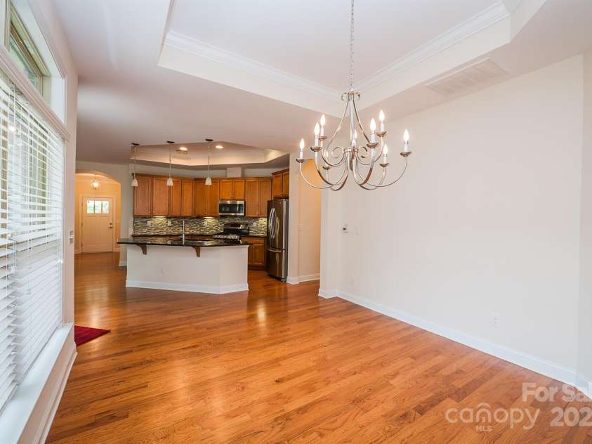 4518 COURTYARD Boulevard, Harrisburg, NC 28075.  MLS# CAR4267459, YatesRealty ID 19971. Kitchen View from the Dinning Room Area