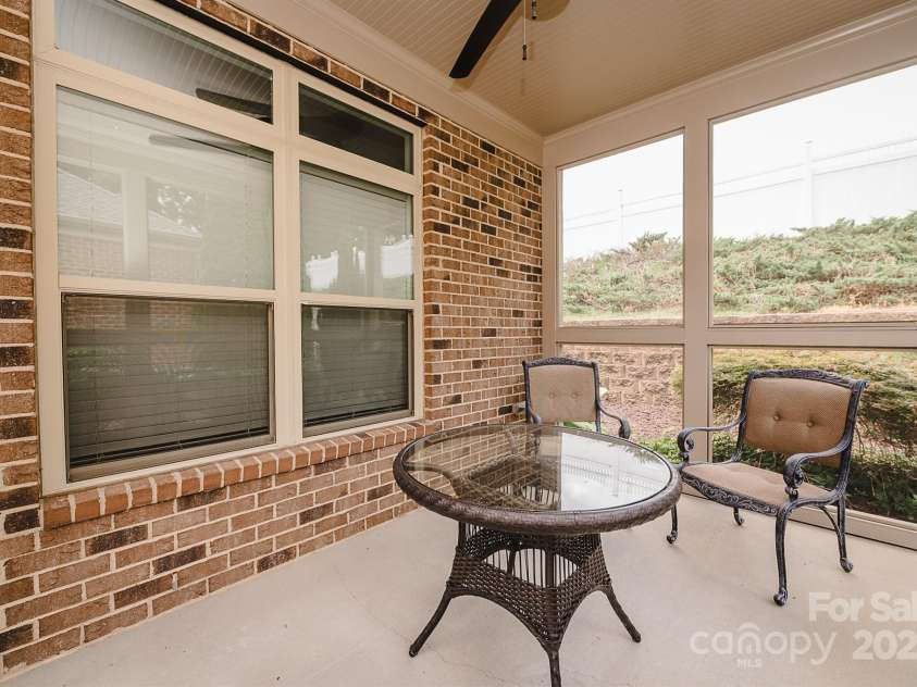 4518 COURTYARD Boulevard, Harrisburg, NC 28075.  MLS# CAR4267459, YatesRealty ID 19971. Very Private Screened In Porch