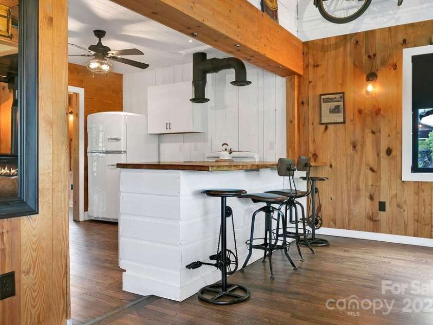 668 Old Hendersonville Highway, Brevard, NC 28712.  MLS# CAR4264741, YatesRealty ID 19974. Livingroom to Kitchen