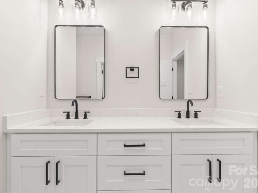 2589 Polo Lane, Maiden, NC 28650.  MLS# CAR4370172, YatesRealty ID 19979. Primary bath room double vanity. Quartz counter tops. Soft close drawers and cabinets