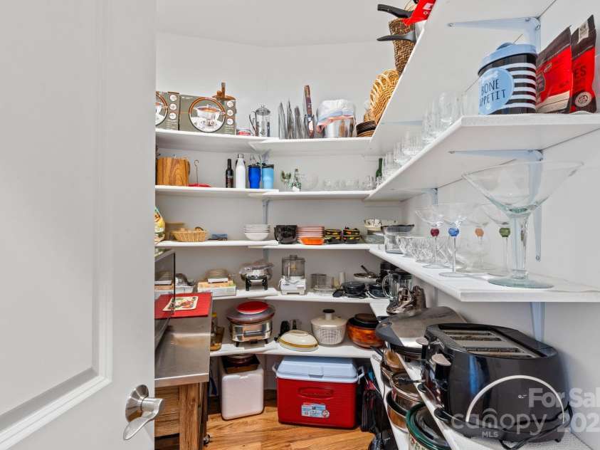 4948 Connestee Trail, Brevard, NC 28712.  MLS# CAR4231748, YatesRealty ID 1998. Butlers pantry for storage & organization (there is also a pantry)