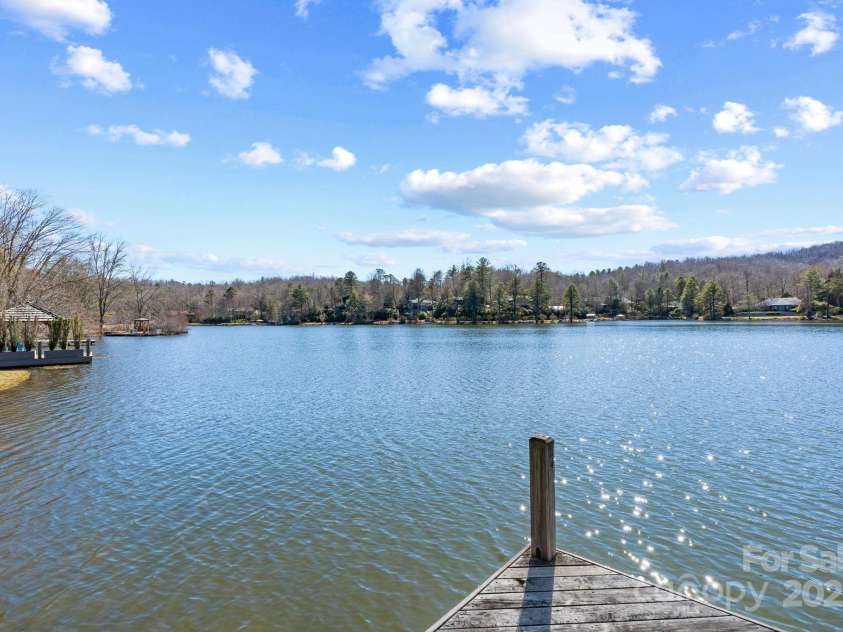 4948 Connestee Trail, Brevard, NC 28712.  MLS# CAR4231748, YatesRealty ID 1998. Connestee Falls offers four stream-fed lakes