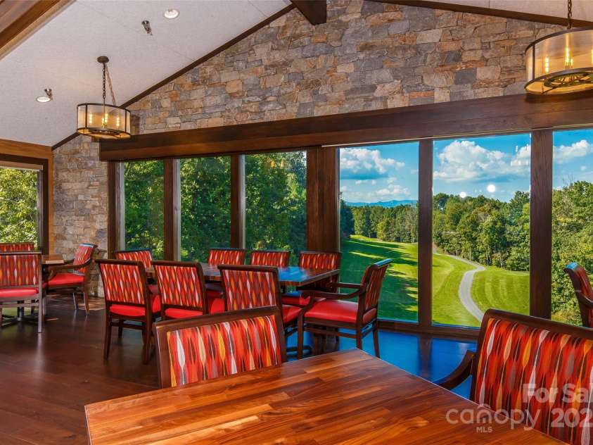 4948 Connestee Trail, Brevard, NC 28712.  MLS# CAR4231748, YatesRealty ID 1998. Enjoy dinner at the clubhouse with a mountain backdrop.