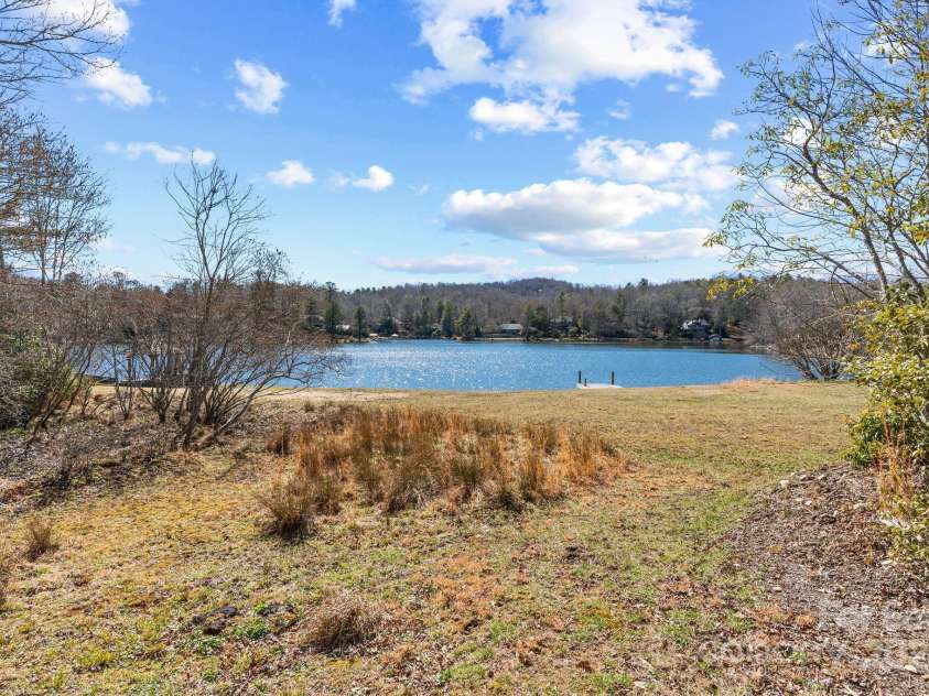 4948 Connestee Trail, Brevard, NC 28712.  MLS# CAR4231748, YatesRealty ID 1998. Expansive lakeside back yard offers many options