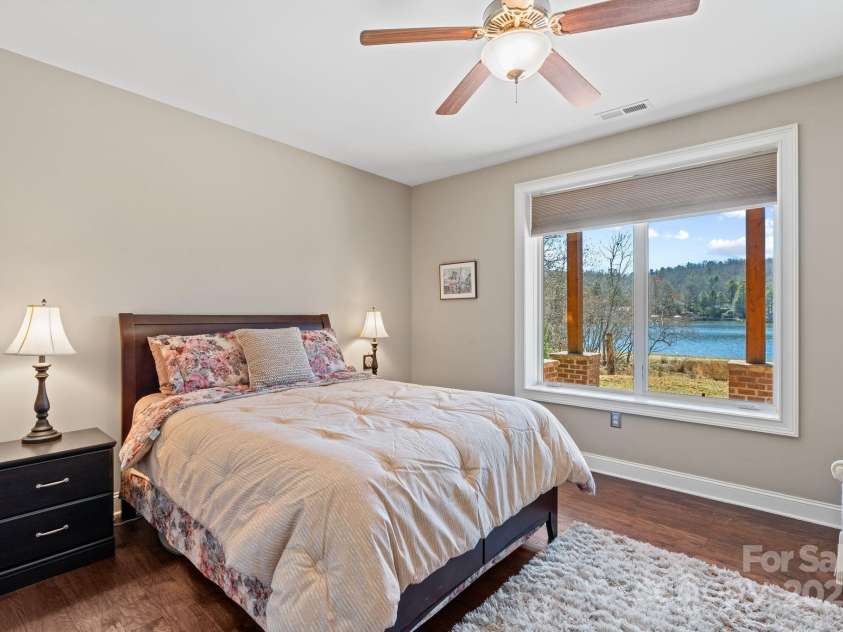 4948 Connestee Trail, Brevard, NC 28712.  MLS# CAR4231748, YatesRealty ID 1998. First lower level guest room with en suite bath