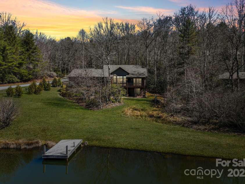 4948 Connestee Trail, Brevard, NC 28712.  MLS# CAR4231748, YatesRealty ID 1998. Flat lot & easy stroll to the water....