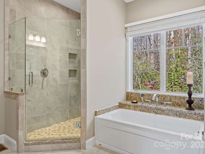 4948 Connestee Trail, Brevard, NC 28712.  MLS# CAR4231748, YatesRealty ID 1998. Jetted tub & seperate walk in shower