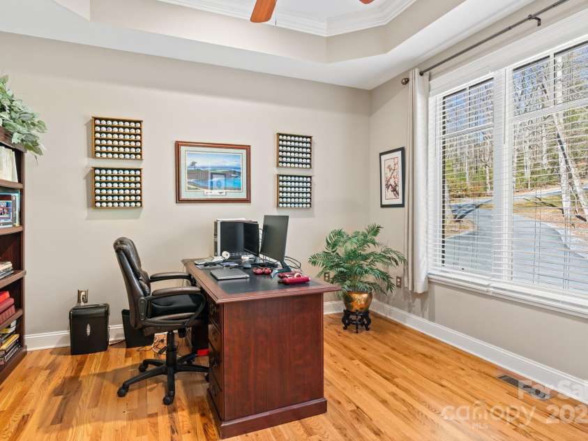 4948 Connestee Trail, Brevard, NC 28712.  MLS# CAR4231748, YatesRealty ID 1998. Main floor office with french doors for privacy