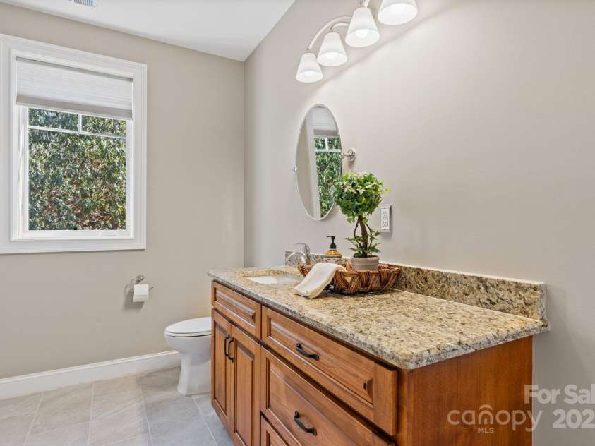 4948 Connestee Trail, Brevard, NC 28712.  MLS# CAR4231748, YatesRealty ID 1998. Private bath with walk-in shower