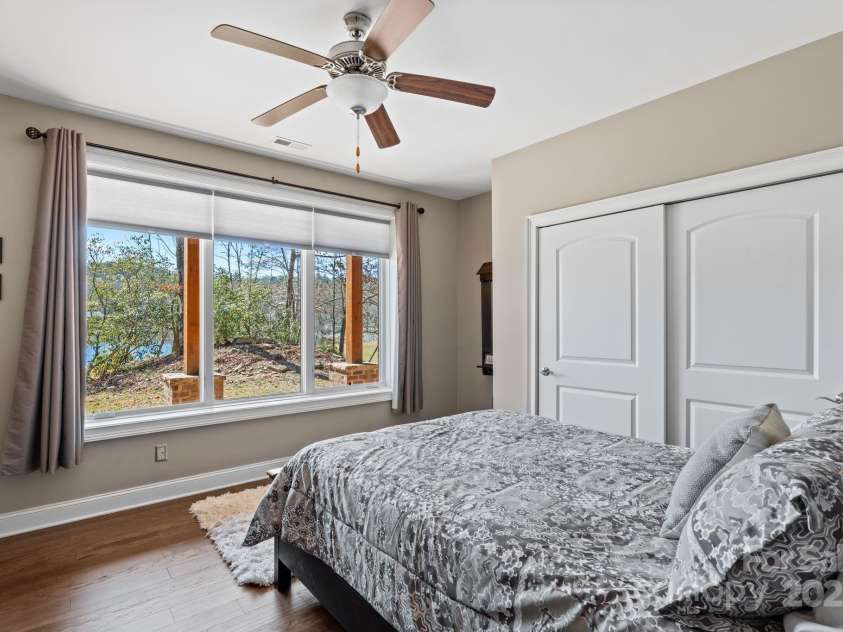 4948 Connestee Trail, Brevard, NC 28712.  MLS# CAR4231748, YatesRealty ID 1998. Second lower level guest room with en suite bath