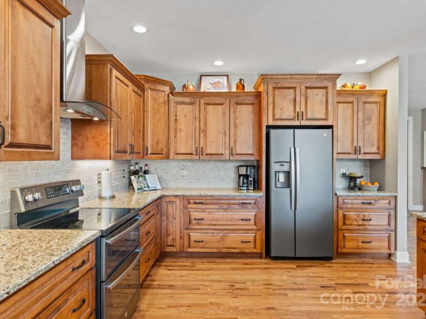 4948 Connestee Trail, Brevard, NC 28712.  MLS# CAR4231748, YatesRealty ID 1998. Stylish slate appliances & extra deep cabinets