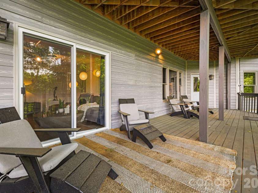5 Saddle Ridge, Fletcher, NC 28732.  MLS# CAR4375966, YatesRealty ID 1998. Lower Covered Deck