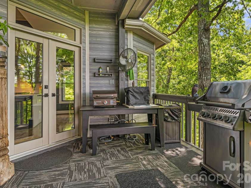 5 Saddle Ridge, Fletcher, NC 28732.  MLS# CAR4375966, YatesRealty ID 1998. Main Level Covered Deck
