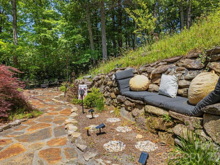 5 Saddle Ridge, Fletcher, NC 28732.  MLS# CAR4375966, YatesRealty ID 1998. Stone Sofa