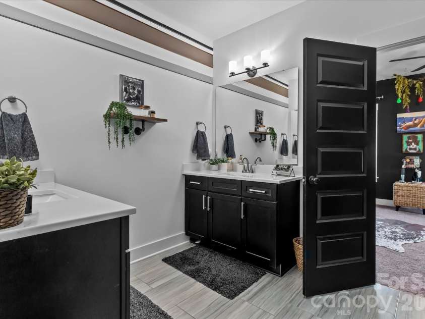 355 Cal Kennedy Road, Cleveland, NC 27013.  MLS# CAR4371840, YatesRealty ID 19980. Separate bathroom vanities in the large shared Jack & Jill bathroom