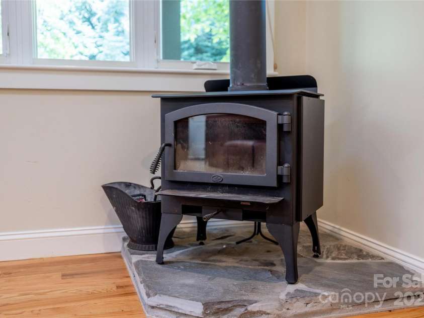 122 Bent Creek Preserve Road, Asheville, NC 28806.  MLS# CAR4266867, YatesRealty ID 19981. Lopi Wood Stove