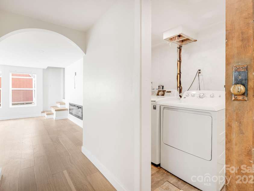 74 Beverly Road, Asheville, NC 28805.  MLS# CAR4239115, YatesRealty ID 19986. Laundry in primary.