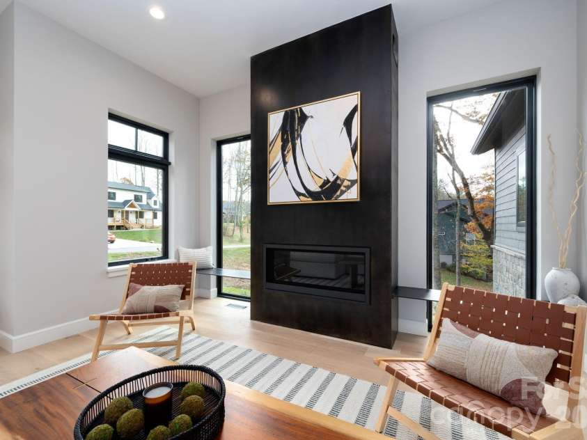 25 Ted Linn Drive, Fairview, NC 28730.  MLS# CAR4374836, YatesRealty ID 19987. Floor-to-Ceiling Rolled Steel Fireplace