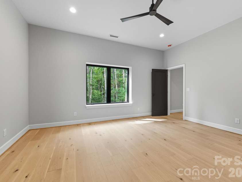 25 Ted Linn Drive, Fairview, NC 28730.  MLS# CAR4374836, YatesRealty ID 19987. Lower Level Fourth/Guest Bedroom