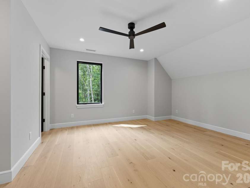 25 Ted Linn Drive, Fairview, NC 28730.  MLS# CAR4374836, YatesRealty ID 19987. Spacious Upper Level Second Bedroom