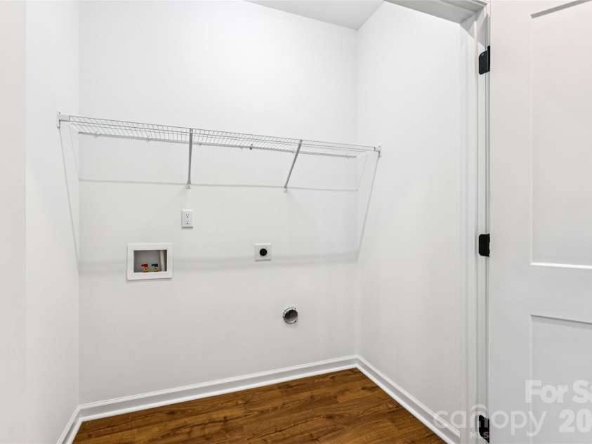 5840 Pittmon Lane, Kannapolis, NC 28081.  MLS# CAR4374428, YatesRealty ID 19989. Laundry in hall upstairs