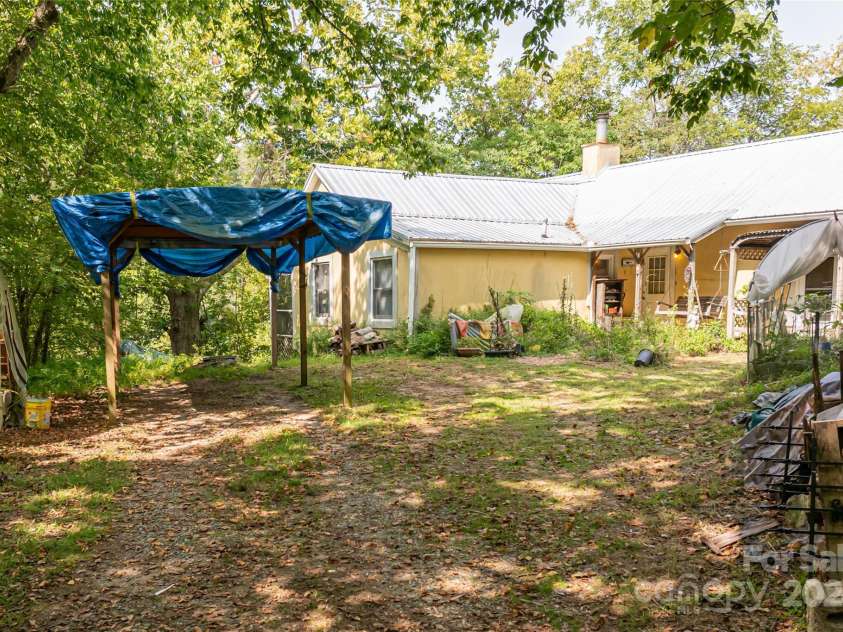 2347 Old Marshall Highway, Alexander, NC 28701.  MLS# CAR4176714, YatesRealty ID 1999. Carport and Parking Area