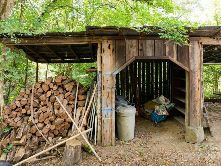 2347 Old Marshall Highway, Alexander, NC 28701.  MLS# CAR4176714, YatesRealty ID 1999. Firewood Storage and Shed