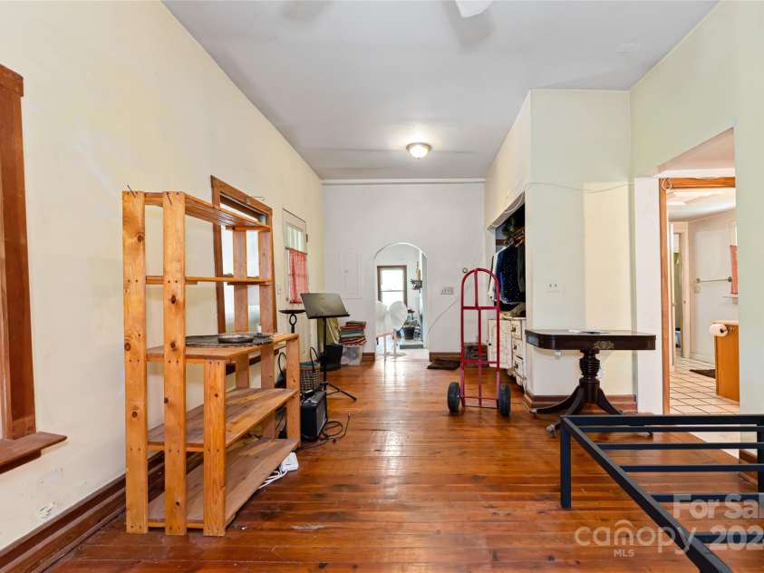 2347 Old Marshall Highway, Alexander, NC 28701.  MLS# CAR4176714, YatesRealty ID 1999. Unit 1 Bedroom into Living Room