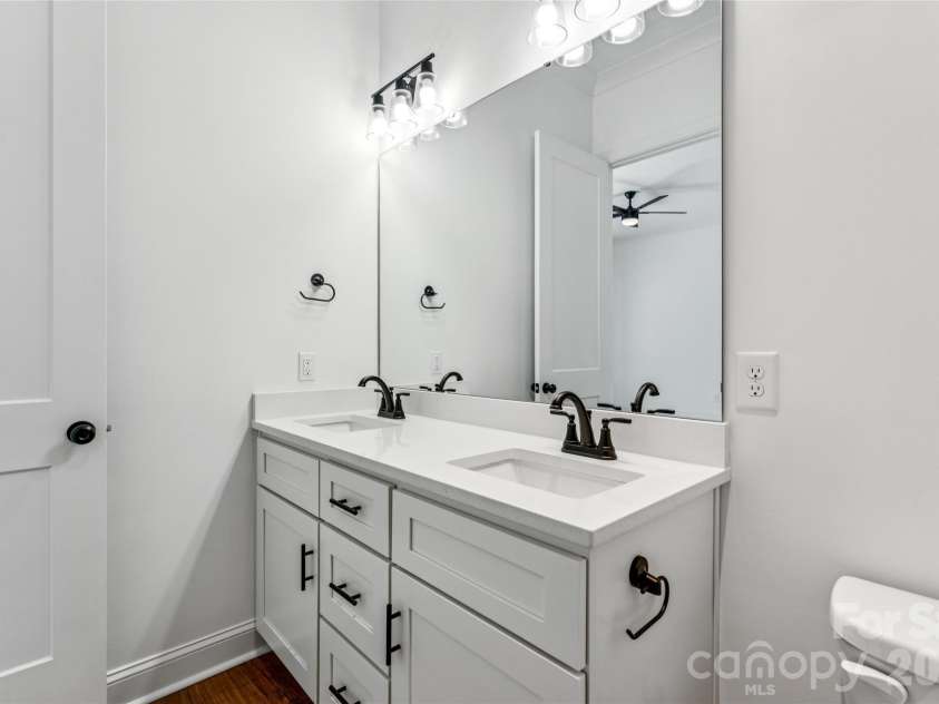 5850 Pittmon Lane, Kannapolis, NC 28081.  MLS# CAR4374429, YatesRealty ID 19990. Primary bathroom ensuite with double vanity
