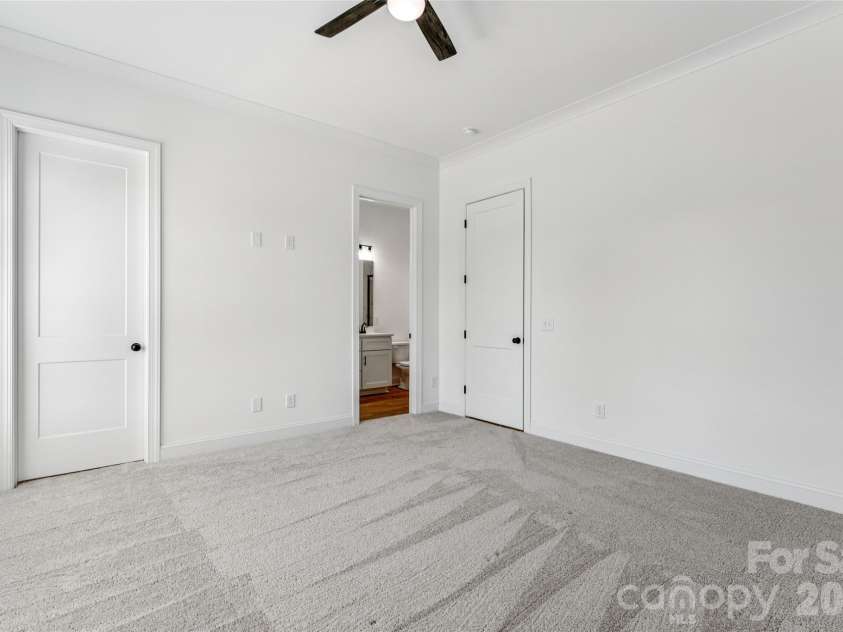 5850 Pittmon Lane, Kannapolis, NC 28081.  MLS# CAR4374429, YatesRealty ID 19990. Primary bedroom