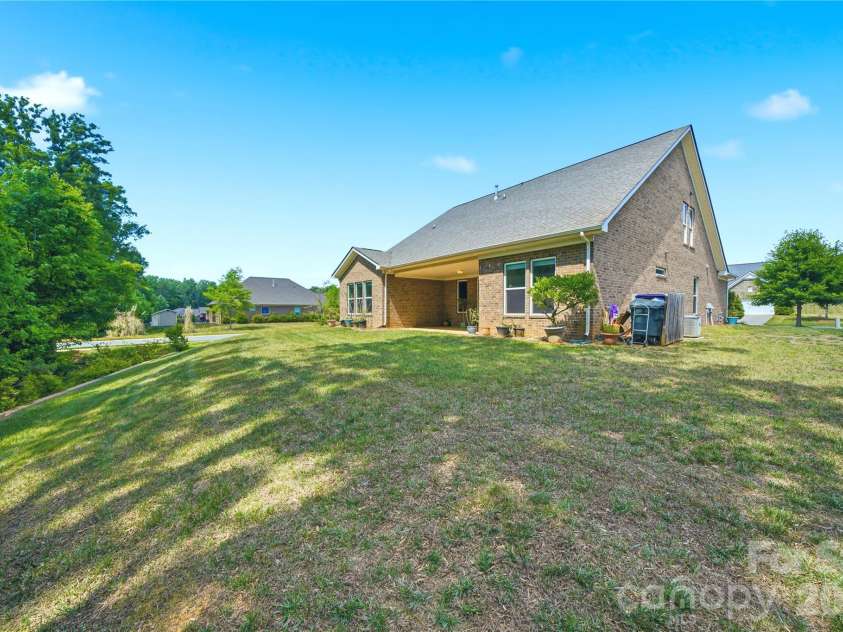 8759 Mullis Forest Court, Mint Hill, NC 28227.  MLS# CAR4377247, YatesRealty ID 19993. BACK YARD