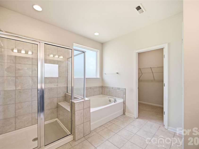 8759 Mullis Forest Court, Mint Hill, NC 28227.  MLS# CAR4377247, YatesRealty ID 19993. Master Bath