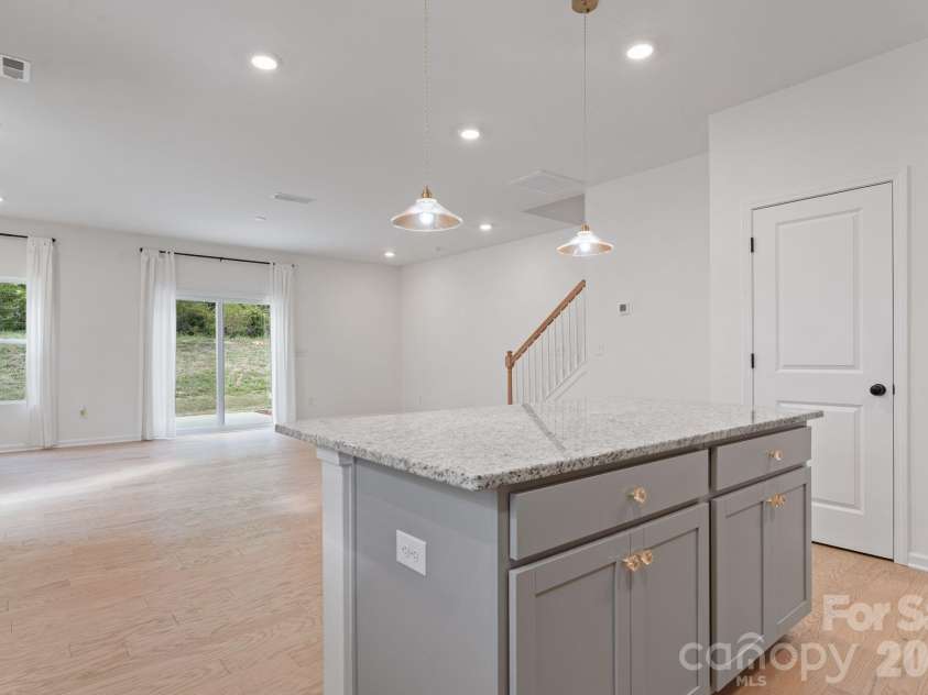 230 Quinn Road, Matthews, NC 28104.  MLS# CAR4378712, YatesRealty ID 19995. Entertain from the kitchen