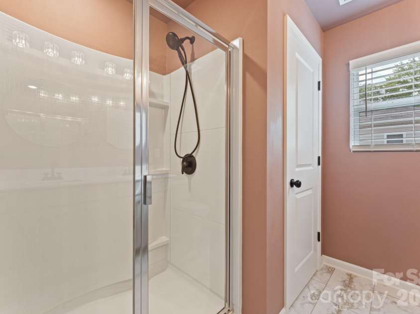 230 Quinn Road, Matthews, NC 28104.  MLS# CAR4378712, YatesRealty ID 19995. Primary shower