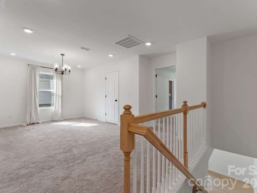 230 Quinn Road, Matthews, NC 28104.  MLS# CAR4378712, YatesRealty ID 19995. Second level loft space for flexibility