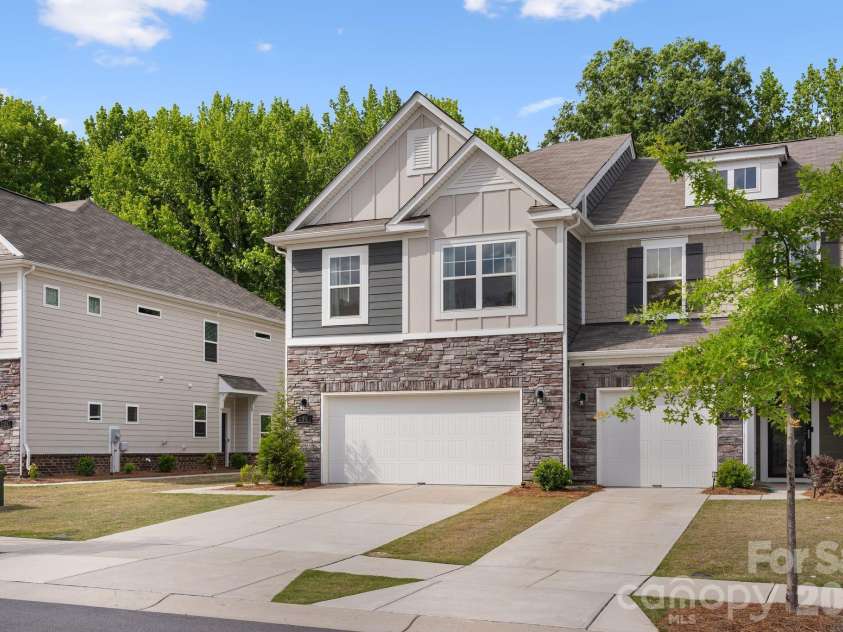 230 Quinn Road, Matthews, NC 28104.  MLS# CAR4378712, YatesRealty ID 19995. Two Car side-by-side garage