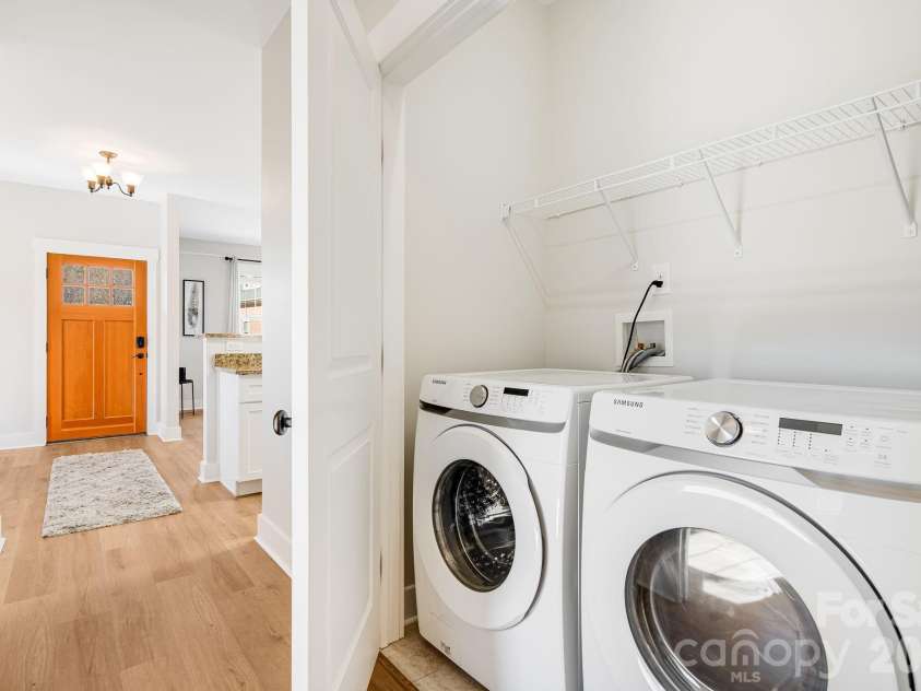11 Byrdcliffe Lane, Asheville, NC 28805.  MLS# CAR4320731, YatesRealty ID 19996. Hallway Laundry Closet