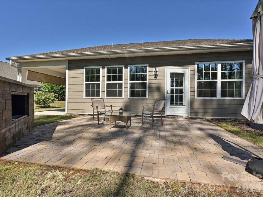 304 Picasso Trail, Mount Holly, NC 28120.  MLS# CAR4374273, YatesRealty ID 19998. Outdoor Fireplace