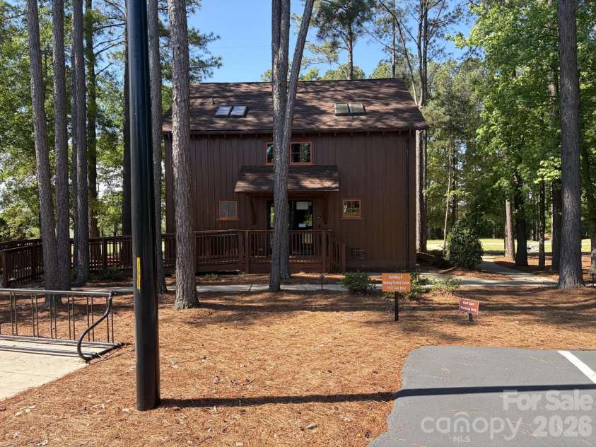 304 Picasso Trail, Mount Holly, NC 28120.  MLS# CAR4374273, YatesRealty ID 19998. Sewing Textiles Cabin