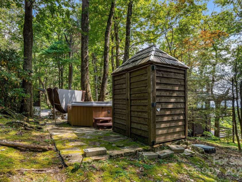 765/764 Osborne Knob Road, Little Switzerland, NC 28752.  MLS# CAR4303194, YatesRealty ID 200. Hot tub and changing room